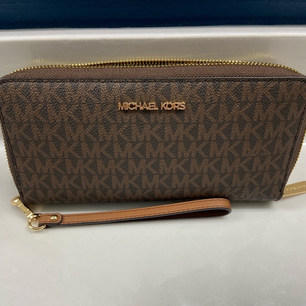 Michael Kors wristlet wallet, $100 or best offer